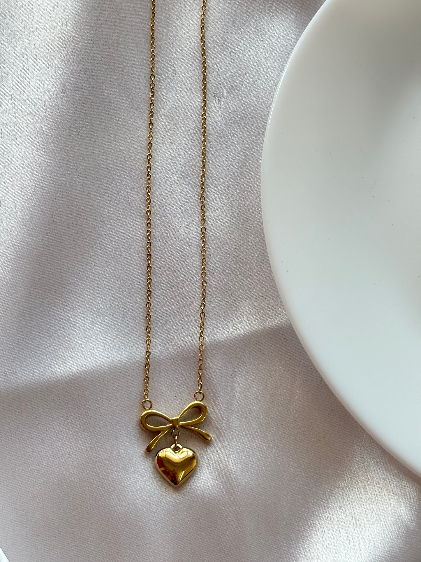 Elegant Gold Heart Bow Necklace