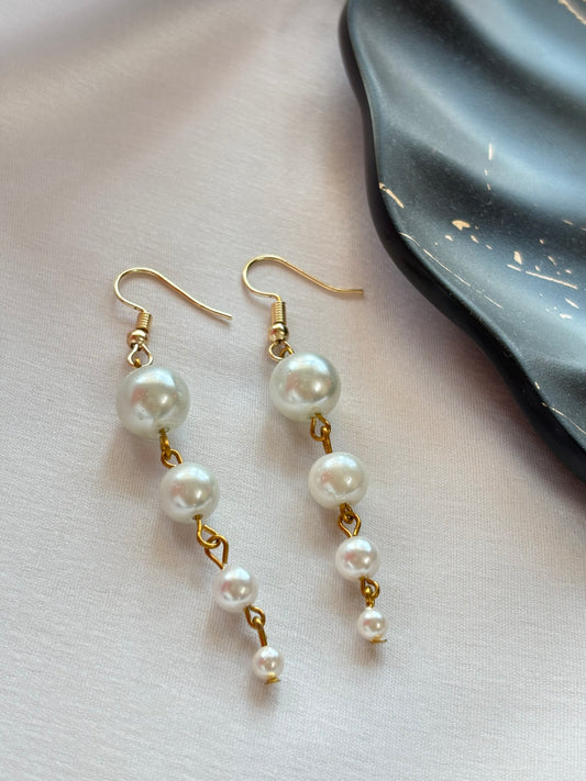 Gold Drop Earrings with Graduated Pearls