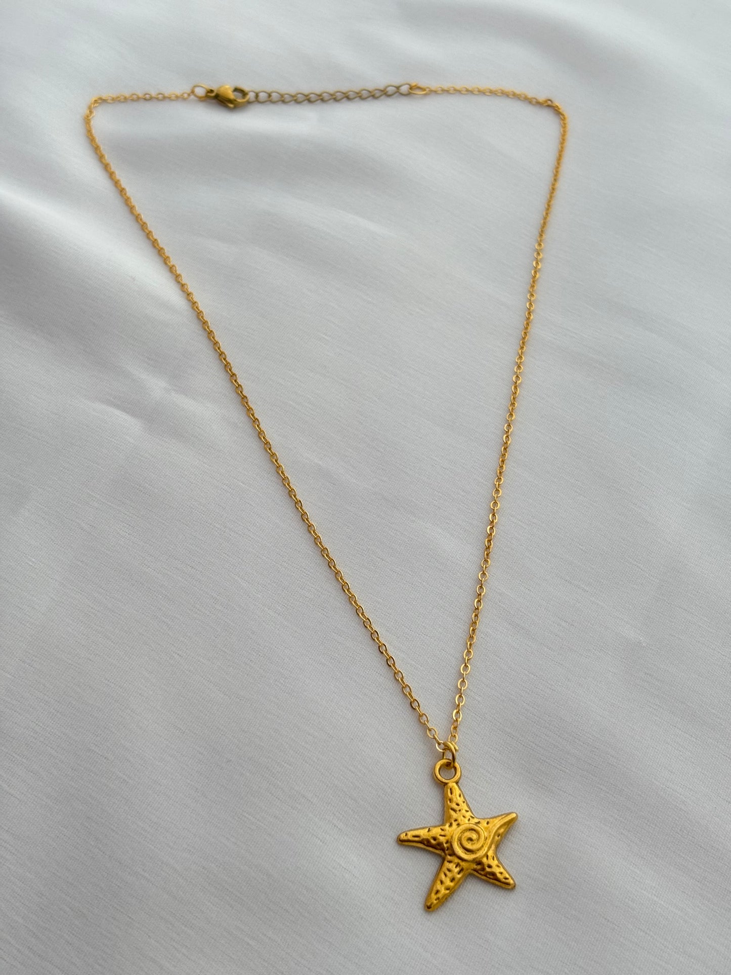 Tiny Golden Cosmic Swirl Necklace