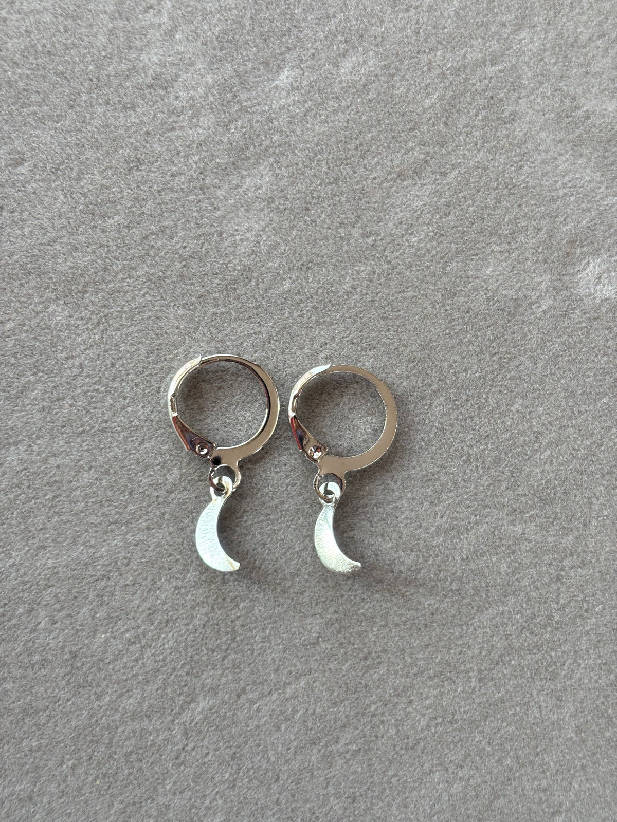 Silver Crescent Moon Huggie Earrings