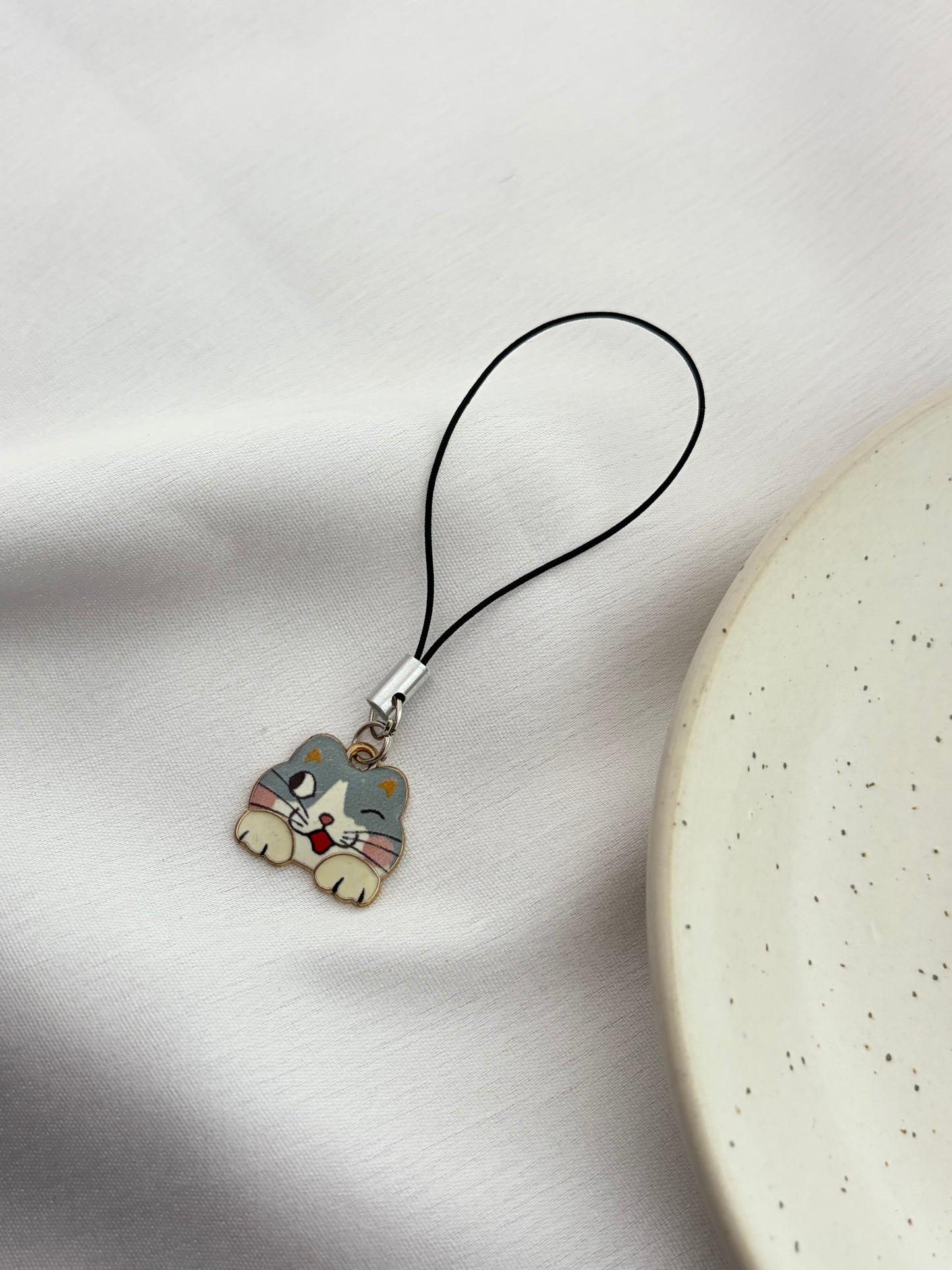 Playful Winking Calico Cat Phone Charm