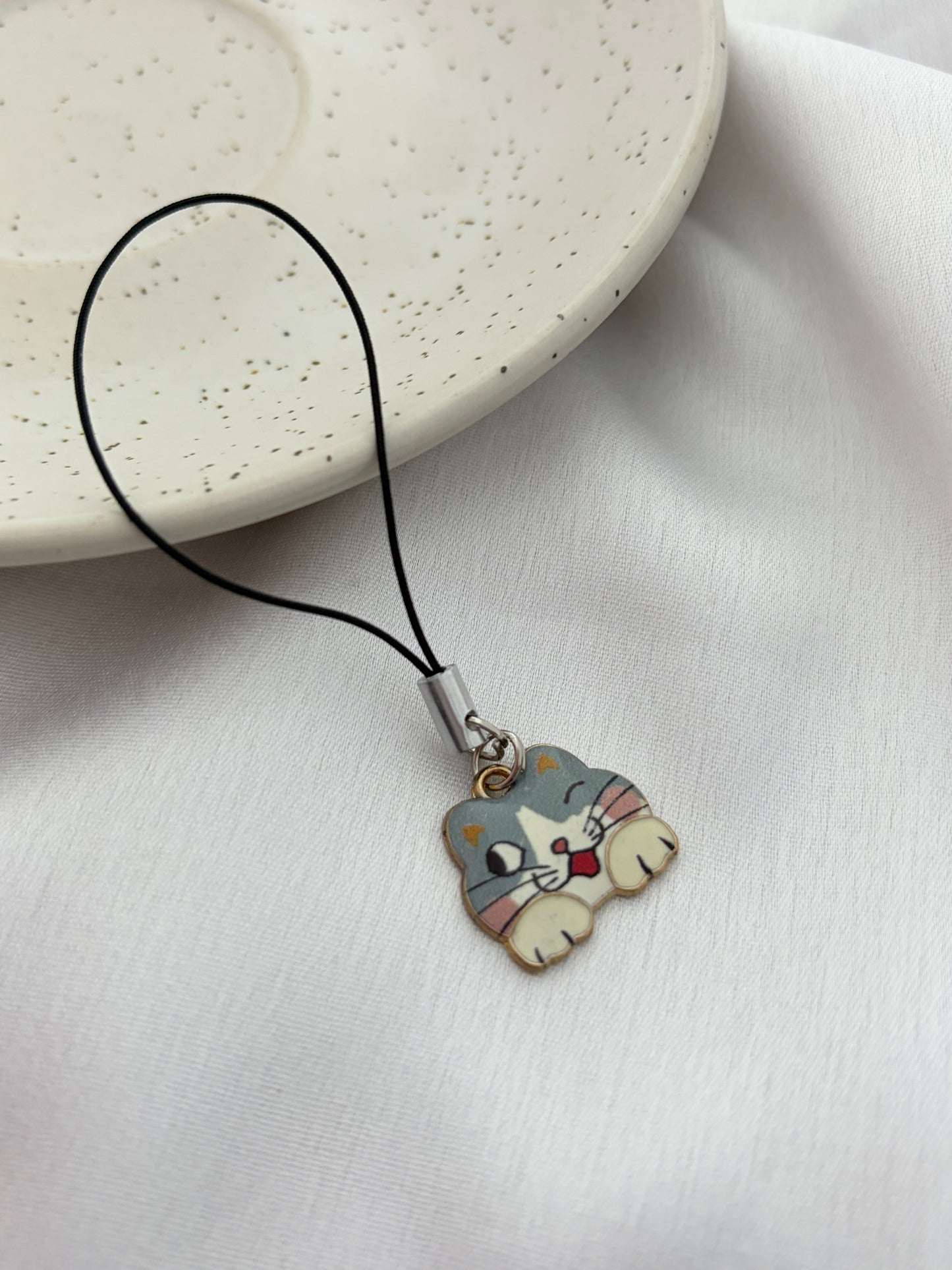 Playful Winking Calico Cat Phone Charm